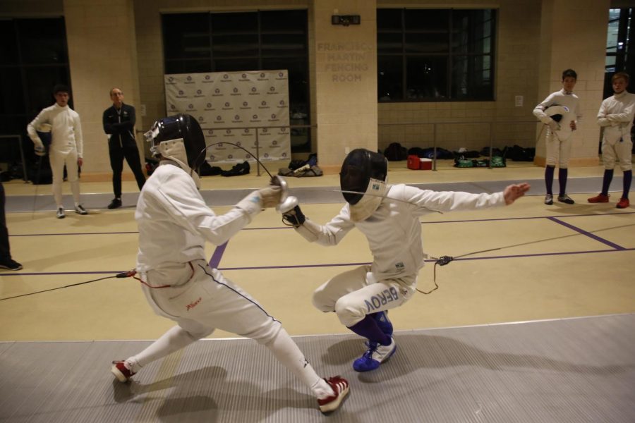 Masters fencers compete in the Francisco Martin Fencing Room. 