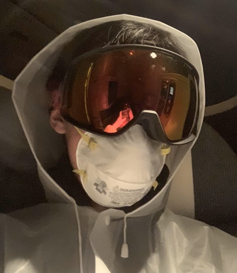 Sophomore Allen Ning wore a mask, goggles, gloves, and raincoat for the entire duration of his flight from New York to Hong Kong. He is now quarantining in a hotel in Hong Kong for 14 days. 