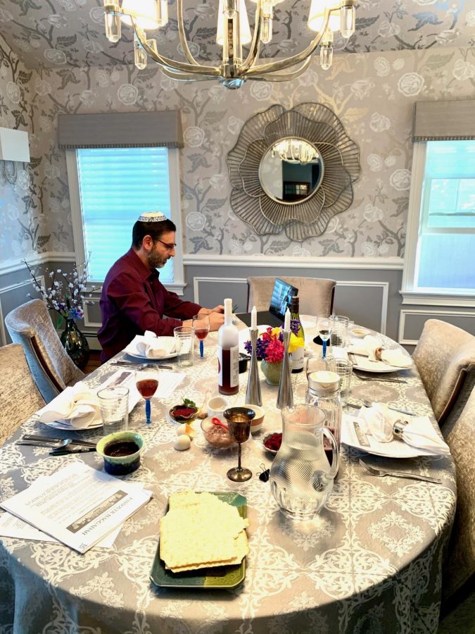 A+parent+of+a+Masters+family+prepares+to+launch+a+zoom+seder.+Due+to+the+ongoing+coronavirus+pandemic%2C+many+had+to+adapt+when+celebrating+the+recent+Passover+and+Holy+Week+holidays.+Additionally%2C+religious+leaders+have+been+available+to+provide+virtual+support+to+those+struggling+during+this+time.++