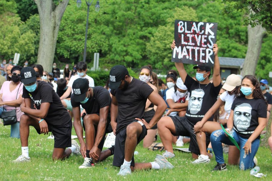 Protestors kneel for justice in Dobbs Ferrys Waterfront Park. The protest was organized in the wake of the killing of unarmed Black man George Floyd. 