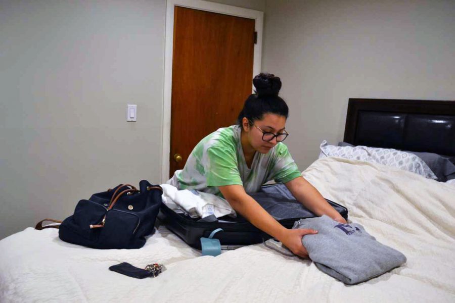 Senior Ariella Uribe packs her clothes and personal belongings to prepare to their return to campus this Saturday.