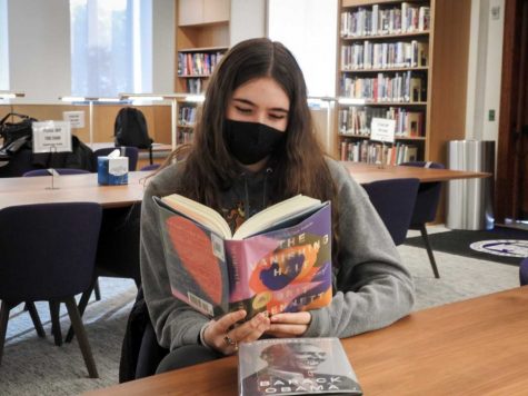 Masters sophomore Stella Simonds sits in the library reading. When the COVID-19 pandemic hit, the book industry went through many ups and downs, but ultimately found success in 2020.