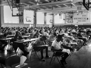 A group of students sweat out their last hour of their history exam in Strayer Gym. Although students did not take
any final exams this past school year due to Covid-19, exams typically take place the last week of school.