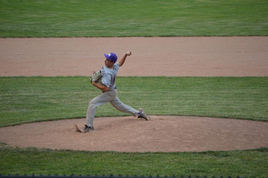 Junior Ethan Rosenberg throws a pitch in Masters 10-0 loss to Rye Country Day.