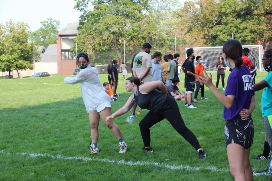 JENNY XU AND ELIZABETH Fletcher tried their hand at “ninja” during the annual
Dorm Olympics on campus. The boarding community is back together at Masters
after more than a year apart.