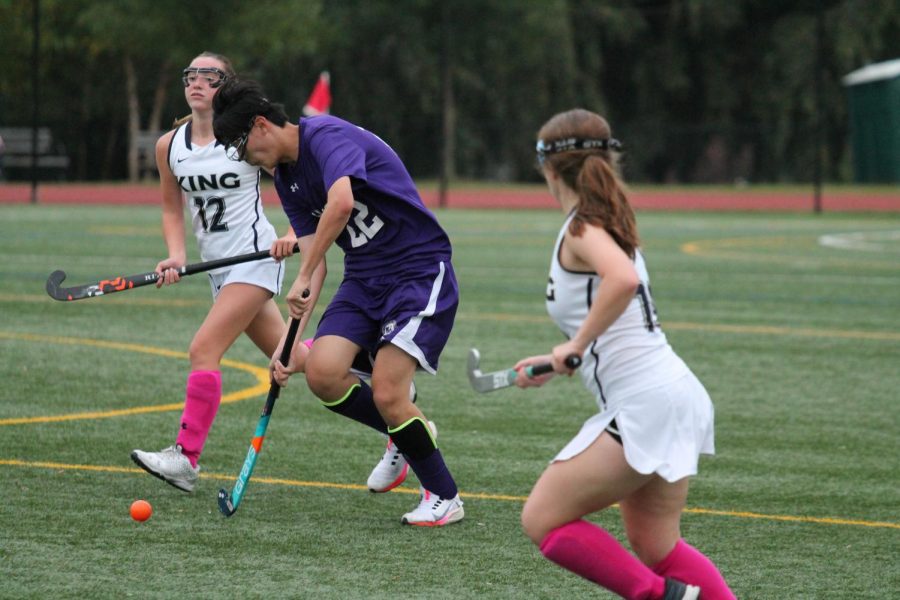 Sophomore Bob Jiao participates in a field hockey game against The King School on October 23. 