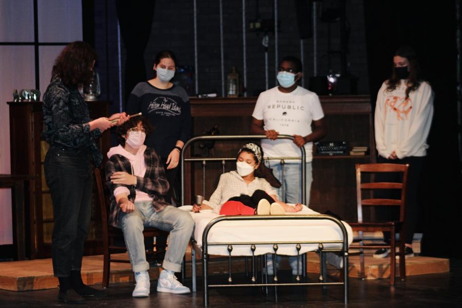 Students rehearse Dracula on stage in the Claudia Boettcher Theatre.