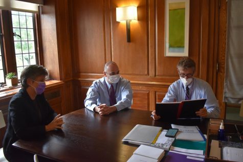 Head of School Laura Danforth, Dean of Faculty Sam Savage and Chief Financial Officer Ed Biddle discuss pandemic finances in Danforths office.