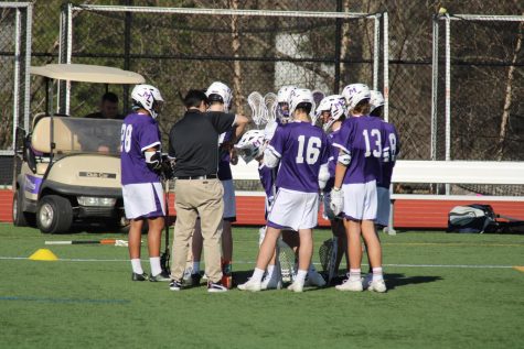 The defenders on the boys’ varsity lacrosse team circle around Coach Thorn. It is Thorn’s first year as a lacrosse coach at Masters and he said he hopes to keep improving his players.