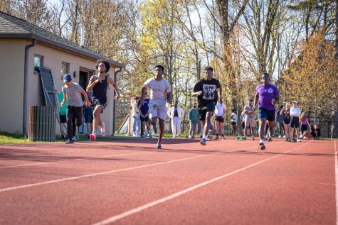 Muliple track team members work on sprints during an April practice. From left to right: Peter Vega 23, Demi Oni 23 Christopher Barnaby 22, Amechi Abuda 22, 