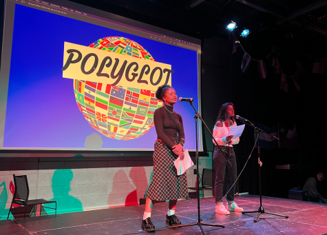 Junior Sage Weinstock and Senior Karina Mangru (left to right) preform a Spanish duet at Masters first ever Ployglot, a multilingual talent show with no English allowed 