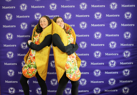 Seniors Hannah Schapiro and Stella Simonds dressed up together in taco costumes for Halloween.