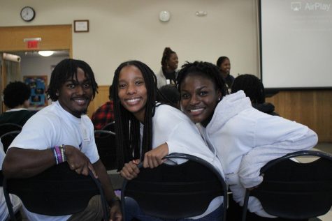 Seniors Cameron Lovett, Alexis Estime, and Ashleigh Woodruff in the Doc Wilson Hall during Saturday Summit of Social Justice.