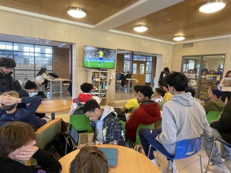 Students gather in the Davis Cafe in the Fonseca Center to watch the Brazil vs. Croatia World Cup quarterfinal game spanning the second and third periods.