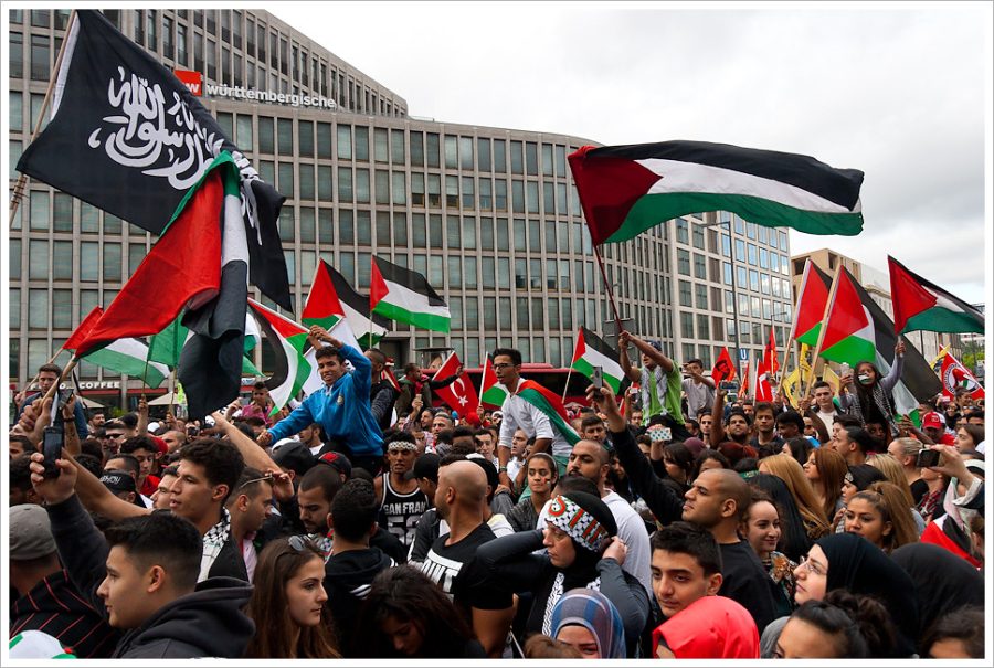 Palestine supporting protesters gathering in the street of Berlin Germany to protest the Israeli governments aggression in the Gaza Strip