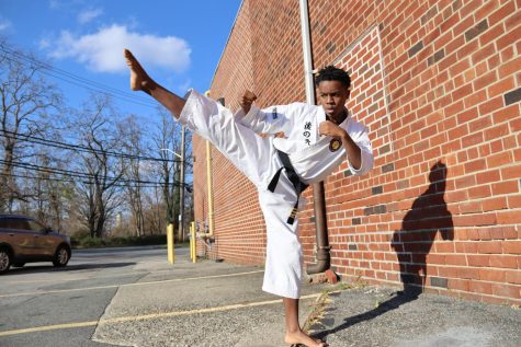 Sophomore Colin Smith shows off some of his karate skills. He demonstrates his talent and understanding for the art and his love for the sport. Throughout his years at Masters, he has learned to balance his time between school, track and field, and karate. Though he has already achieved a black belt, he is still going through training to receive his second degree black belt. 
