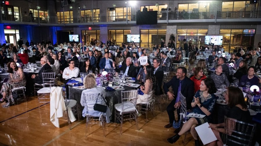 PARENTS, ALUMNI, AND TRUSTEES gathered at the gala to auction and bid on various items, including
Taylor Swift tickets, dinner with Michael Douglas, and many more. Proceeds from the event will be going to the
new “Our Might” initiative, which will seek to enhance the student experience through various improvements.