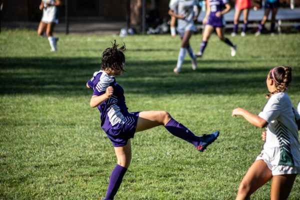 Second year Girls Varsity Soccer player and Sophomore, Magnolia Bing-Edwards stopping the Greenwich Academy attack from advancing. Her defense left a massive impact on the match, leaving the strong Greenwich offense stagnent. 