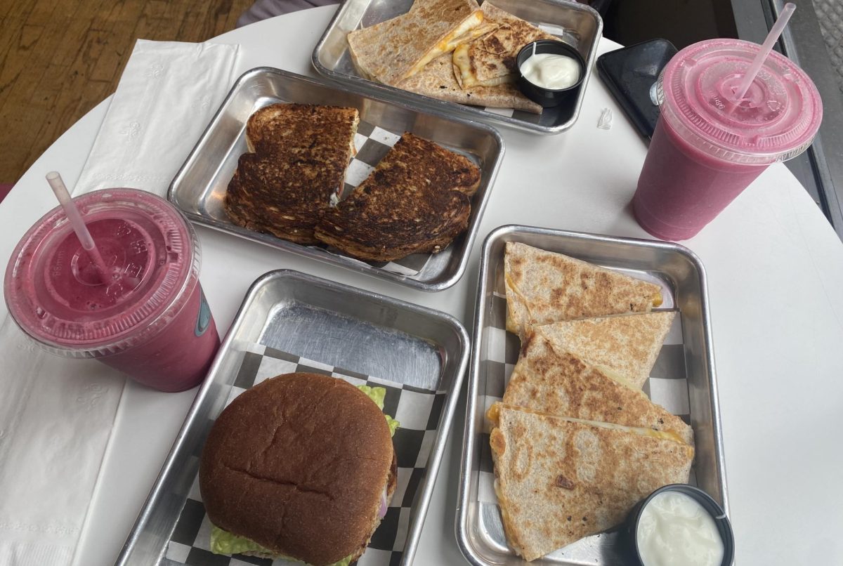 Sweet N Savorys caprese paini, quesadillas with sour cream, turkey burger, and smoothies Daeynerys and Sunrise. 