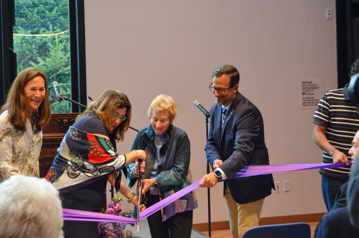 Alumna, Diana Davis Spencer and Abby Spencer Moffat who donated 20 million dollars to the building, cutting the ribbon, marking the official opening of the IEC.