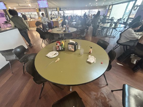 Many students leave tables looking like this in the dining hall. This only creates unnecessary and extra work for the dining hall staff.