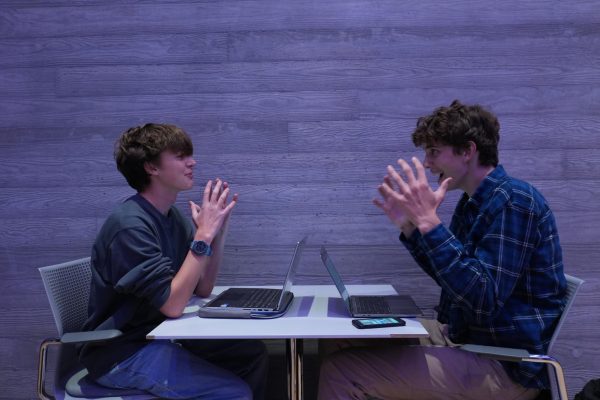 Rohan Lavery '26 and Thomas McCallum '26 practice their debate techniques at a club meeting.