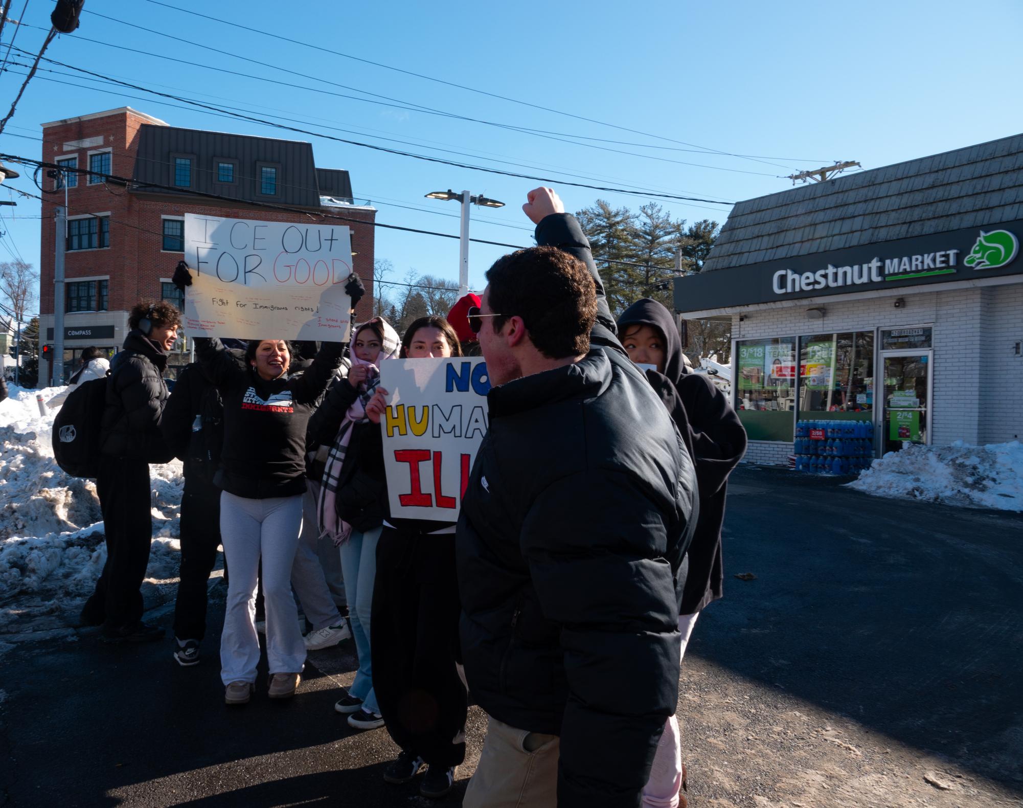 Students stand in front of the Chesnut Market gas station on Ashford Avenue. Mason Dwek '26 led the demonstrators in a chant, and, at the end of the school day, took the train into New York City to join additional protests.