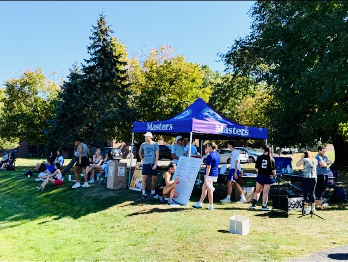 Masters students and faculty spend their afternoons doing work to help the Pickle for a Purpose club and the African Dream Academy raise money and collect school supplies. 