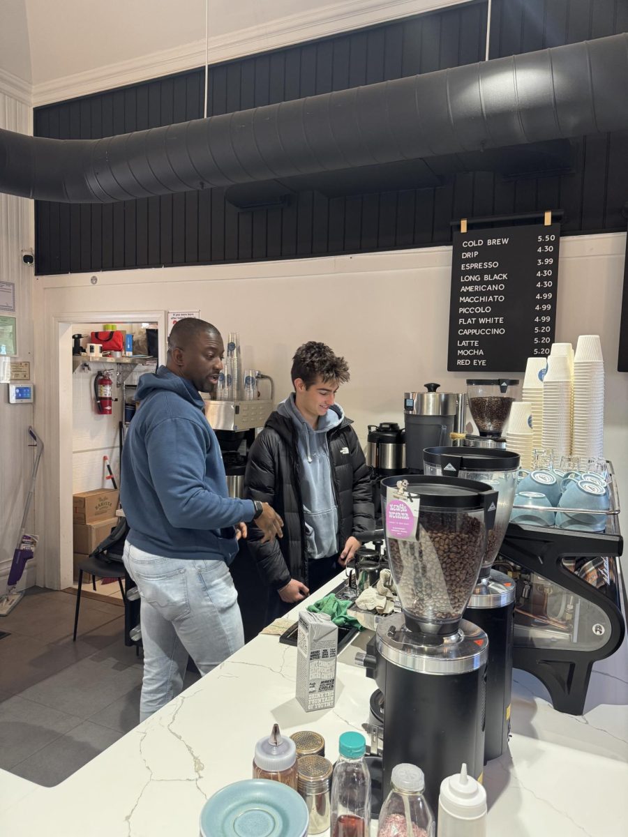  Ethan Smolkin, a junior, is pictured here learning all about how coffee is made in a cafe, and where it originates from. The “Chemistry of Cooking” WinterMission, taught by Science Teachers Frank Greally and Andrew Young, visited Ludy’s Cafe in Irvington to wrap up their four day endeavor of seeing and understanding the science behind favorite foods. The group focused on emulsions and hydrogen bonds, colloids, oils, fats, proteins and acids and bases in the foods people often see in their everyday life.
