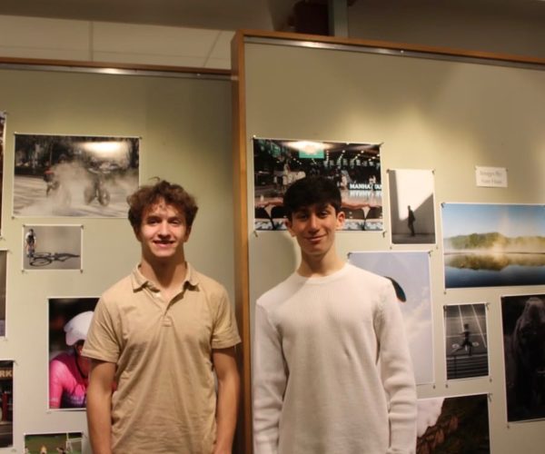Juniors Mason Rosenblatt and Sam Haas stand in front of the Kaleidoscope exhibit on the third floor of the Fonseca Center.