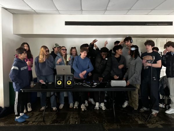 Student DJs are bringing the party to campus, a skill many developed during the DJ Wintermission. A group of students gathers around a makeshift booth, where Nico Khourylevy '26 manages the decks and keeps the crowd moving. 