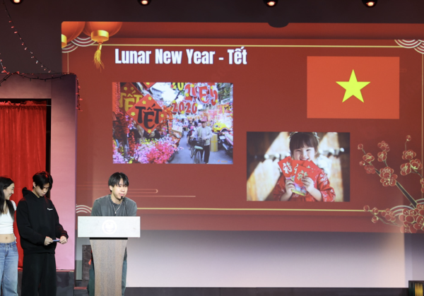 Man Dang '26 presents Lunar New Year celebration in Vietnam during a morning meeting dedicated to Lunar New Year. International students from China, South Korea, and Thailand also presented their diverse culture.