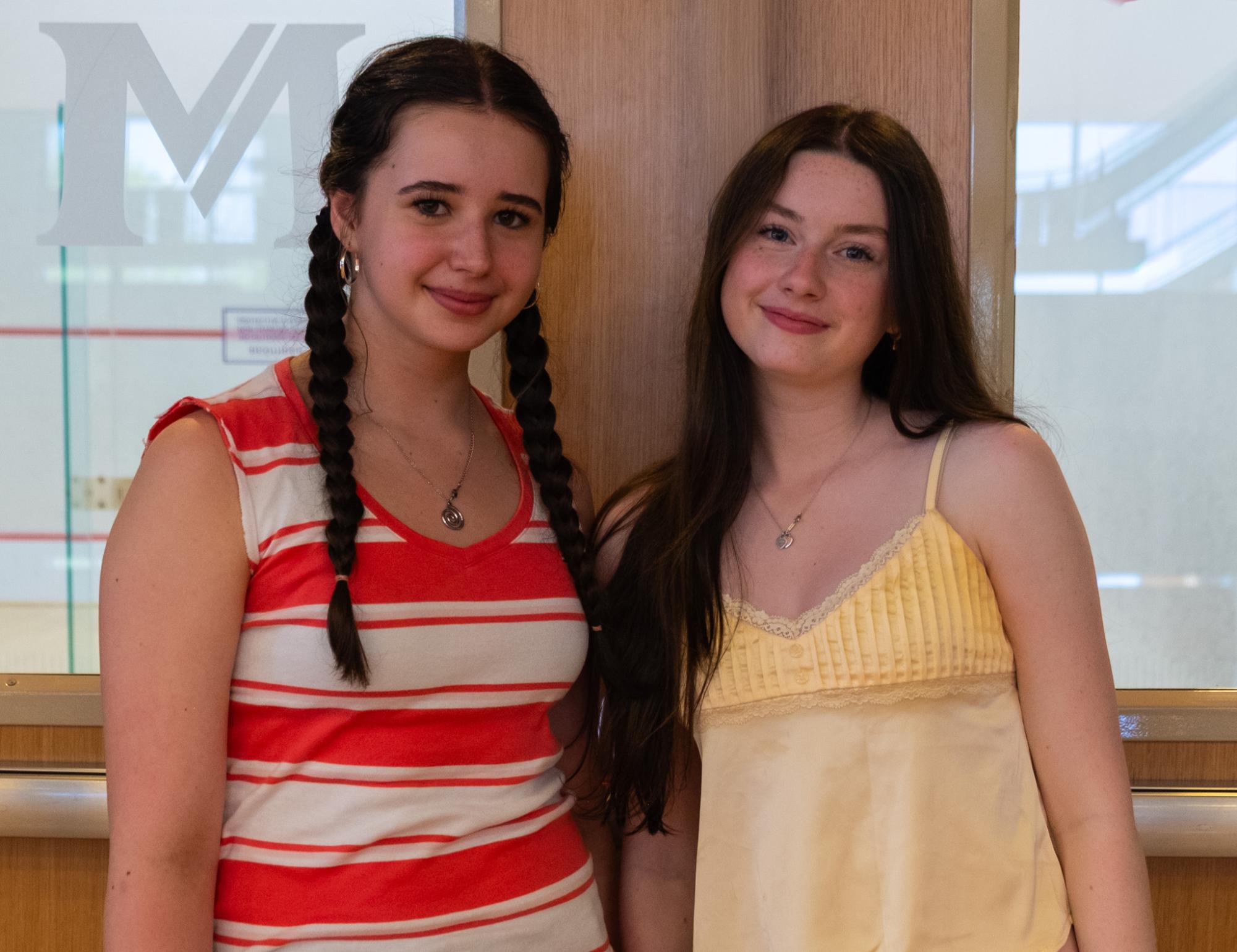 Anastasia Konopleva '29 and Ariella Crane '28, spring sport managers, pose together, ready for another game.