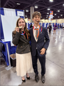 Siena Versaci '27 and Nico Khoury-Levy show off their medals at the Regeneron International Science and Engineering Fair in Phoenix, AZ this May. Versaci took fourth in her field, and Khoury-Levy came home with second place in his field. 