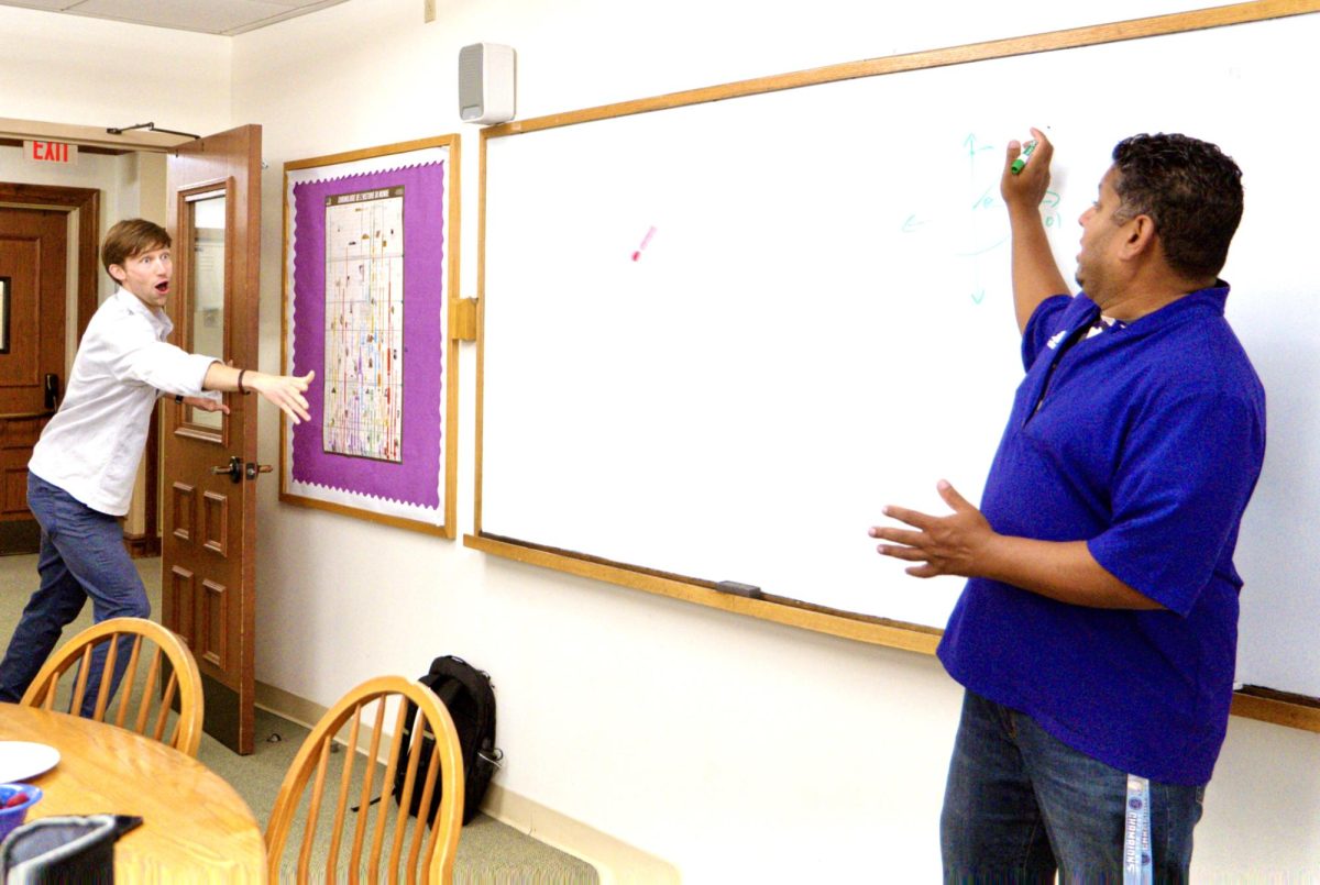 Mook throws a marker to Jaggernauth during class. This moment reflects the playful dynamic of their freindship. As they prepare to leave Masters and return to Hackley, their alma mater, their friendship remains enlivening for the community.